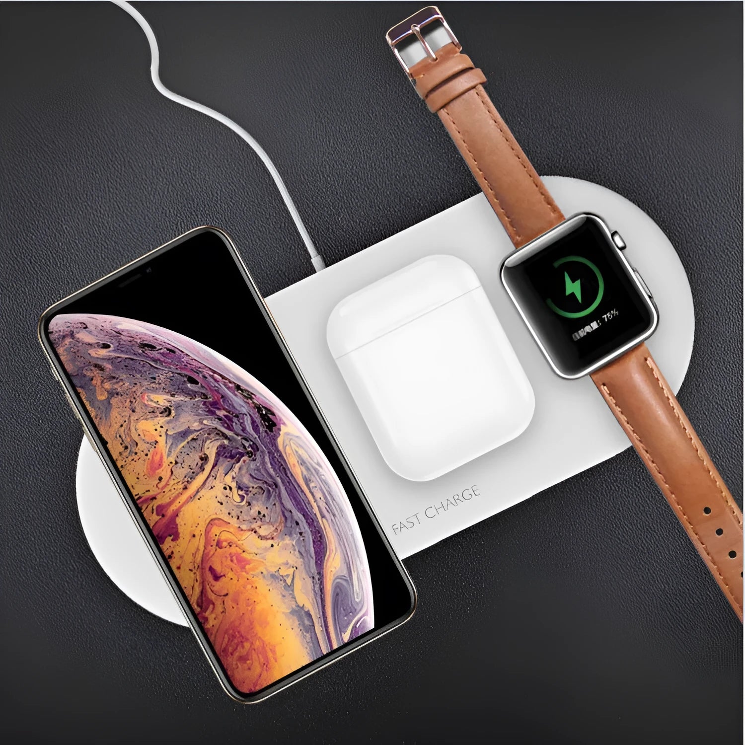 White three-in-one wireless charging station for Apple iPhone, iWatch, and earbuds on a desk.