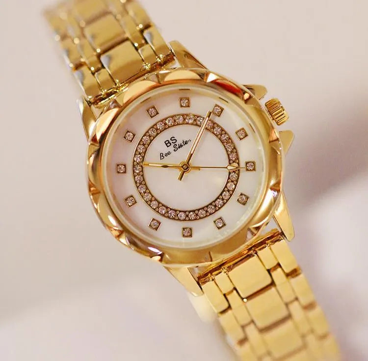 Women's quartz watch with diamond accents in gold colour, mineral glass, 30m water resistant