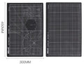 Double-sided A3 self-healing cutting mat in green with centimetre grid layout