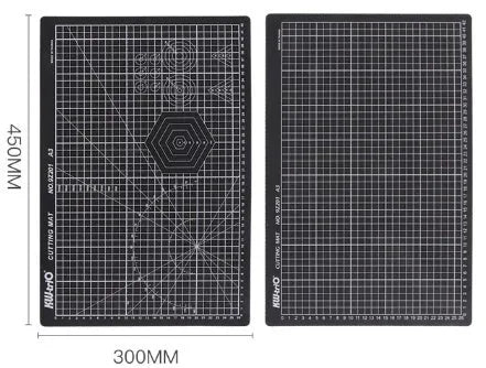 Double-sided A3 self-healing cutting mat in green with centimetre grid layout