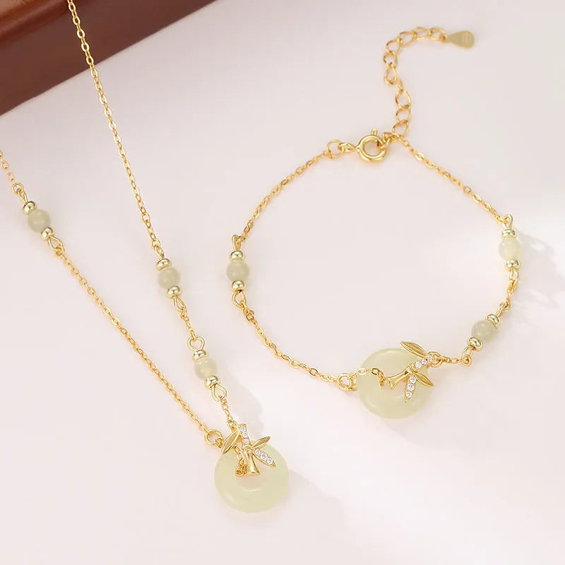 Women's antique style 925 silver bracelet with Hetian jade and peace buckle safety clasp in gold finish