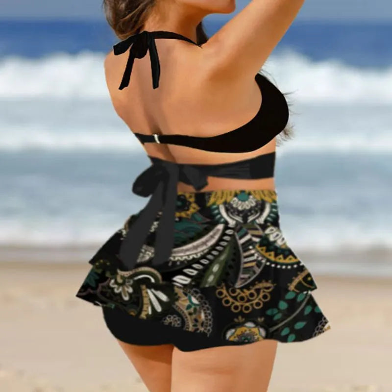 Purple and black women's bikini set with lace-up front and high-waisted split skirt.