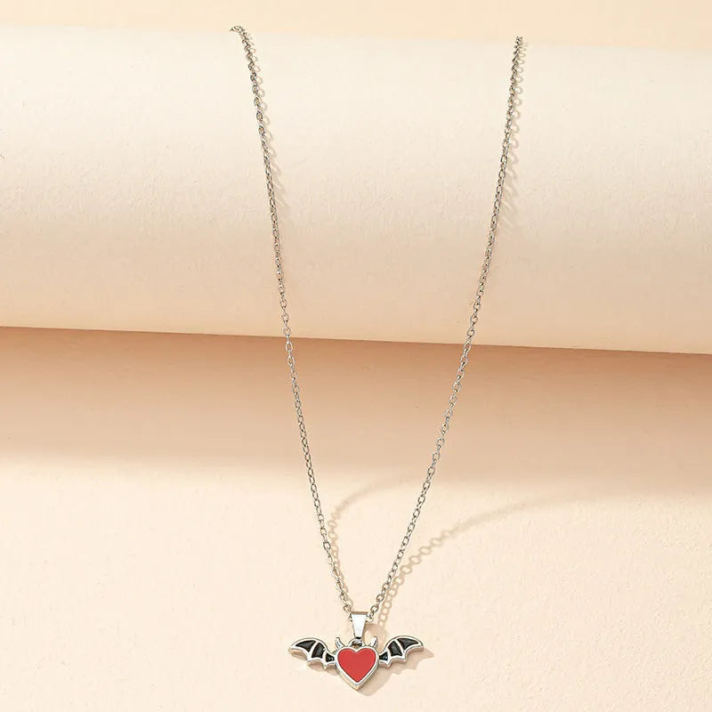 Men's vintage black widow spider pendant necklace with red crystal detail on zinc alloy link chain
