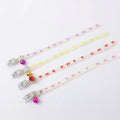 Cat wearing luminous collar with glow-in-the-dark paw print design on adjustable 29cm silicone chain