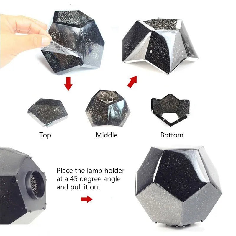 A white plastic LED star projector night light with remote control on a table.