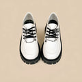 Women's Duke Asterism coloured loafers with a metal cross strap and round toe.