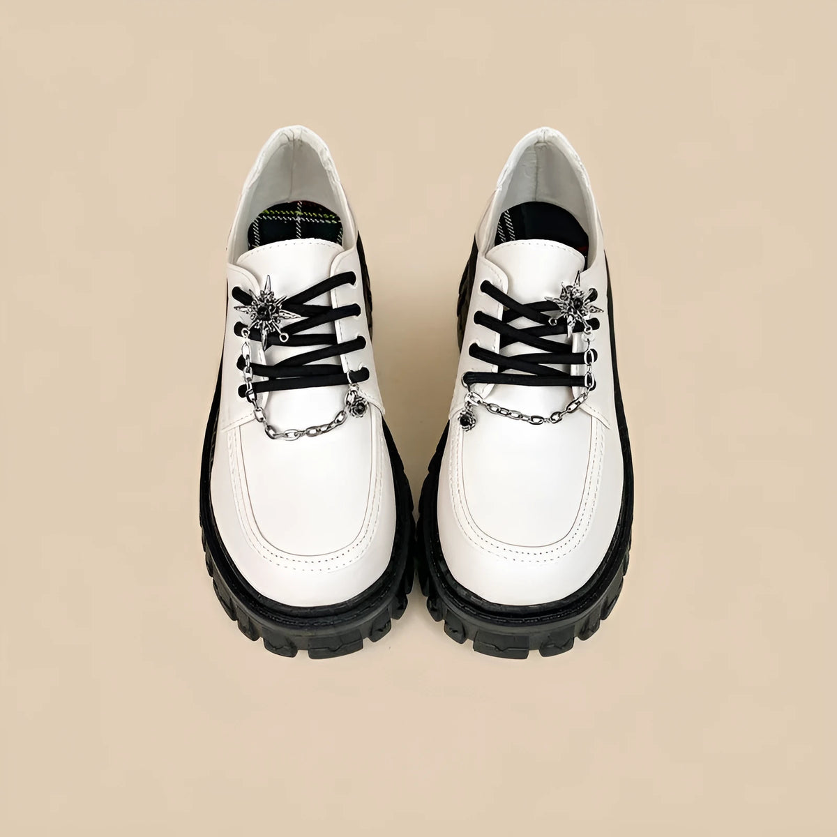 Women's Duke Asterism coloured loafers with a metal cross strap and round toe.