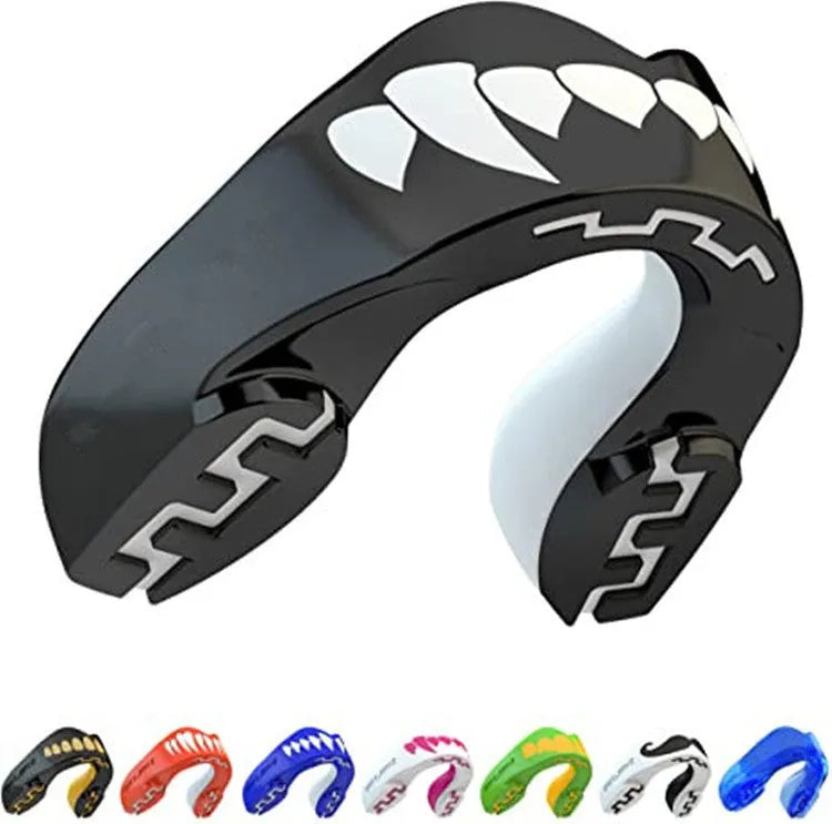 Adult boxing mouthguard with printed tooth design in black and white, for martial arts and fight sports.