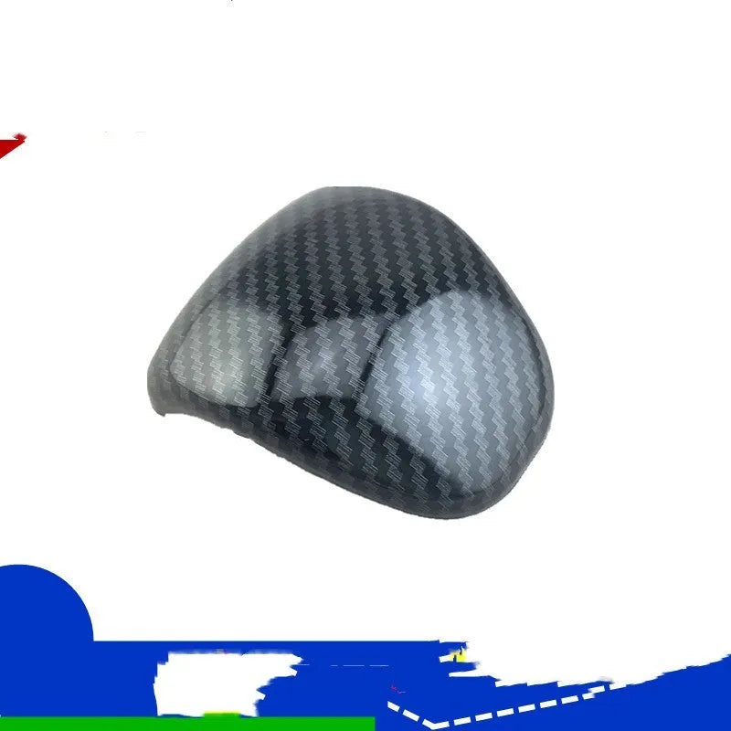 Car gear shift cover in carbon fibre pattern made from ABS plastic
