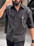 Men's black button-up shirt with regular fit and polyester fabric