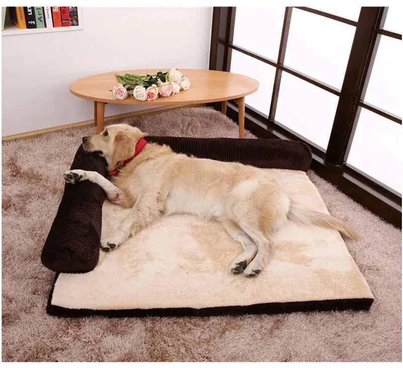Corduroy pet dog bed sofa with removable cover in a grey colour, shown in a living room setting.