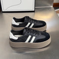 Women's vintage distressed leather sneakers with round toe and lace-up design in beige colour