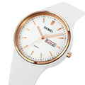 Women's silicone strap quartz watch with calendar display on a white background, showing the stainless steel pin buckle.