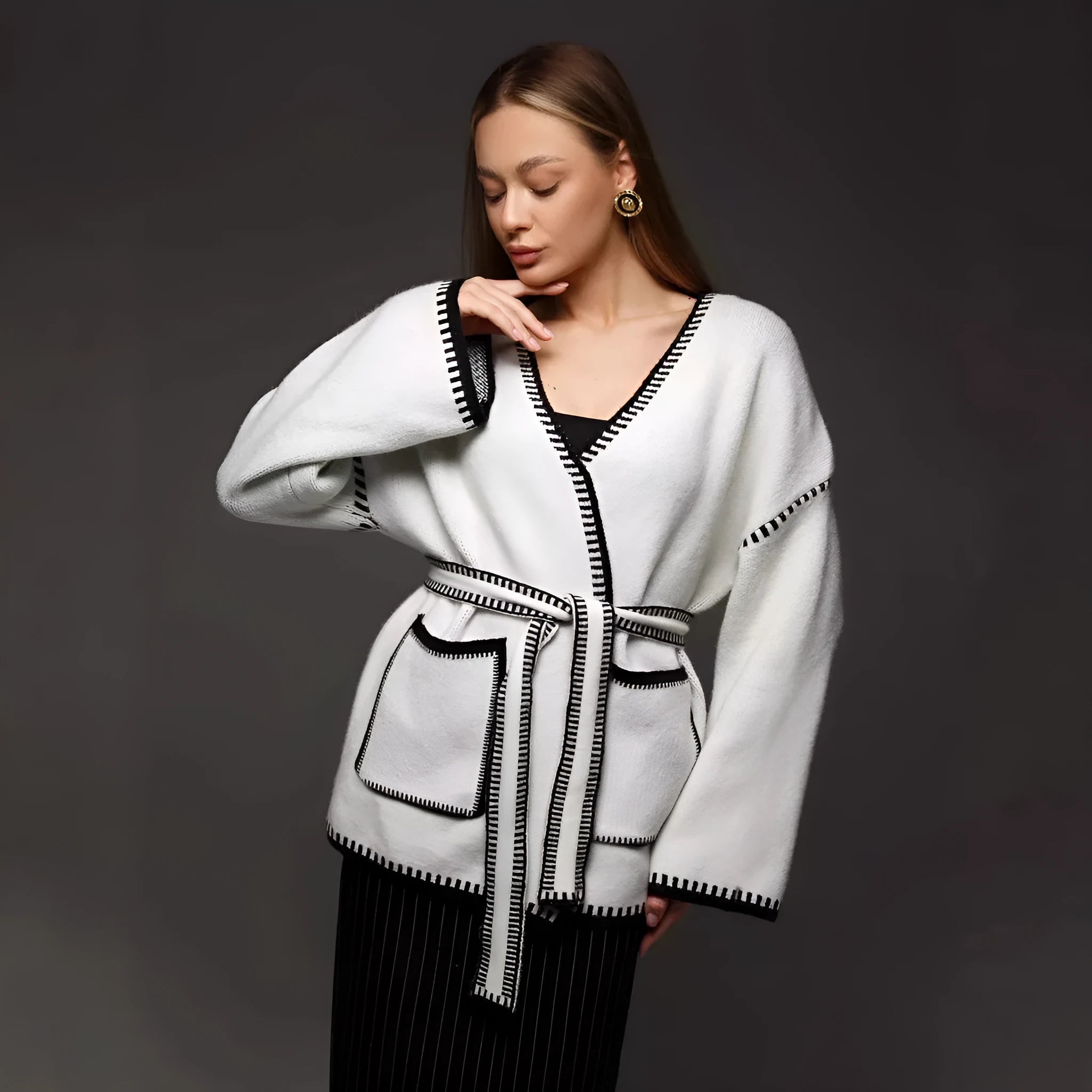 Loose fit knitted cardigan in imitation cashmere fabric, available in black, camel or white colour