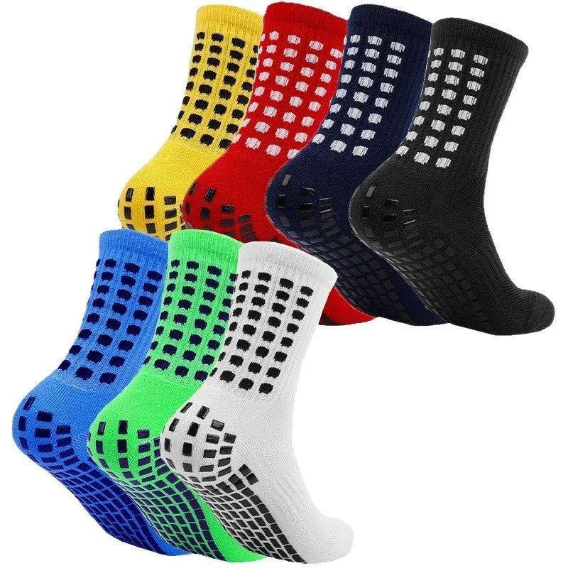 Breathable basketball socks with non-slip rubber stud sole in mid-calf length on court background