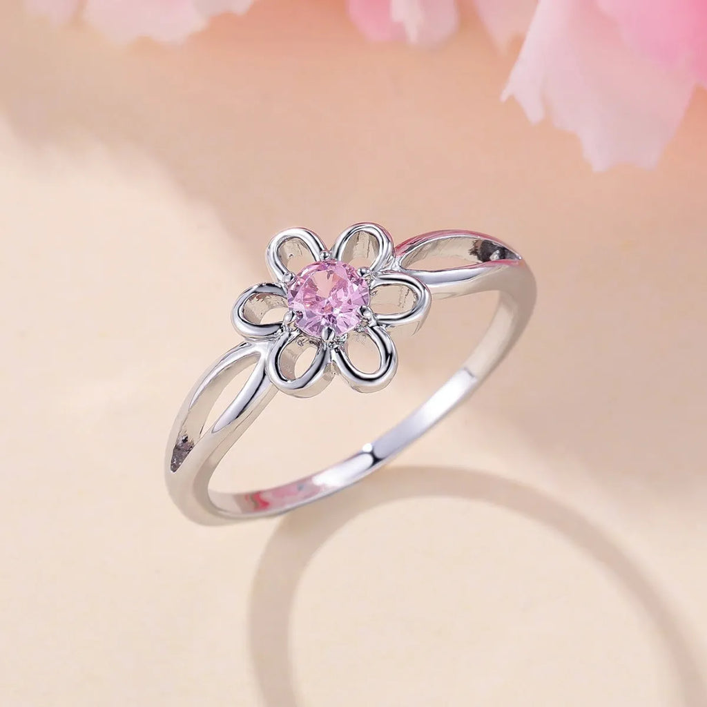 Copper flower hollow fashion ring with platinum pink diamond electroplated finish