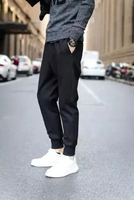 Black casual sports trousers with straight leg and tether closure, front view