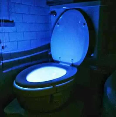 8-colour motion sensor toilet light with flexible adhesive mount for easy installation on toilet surface