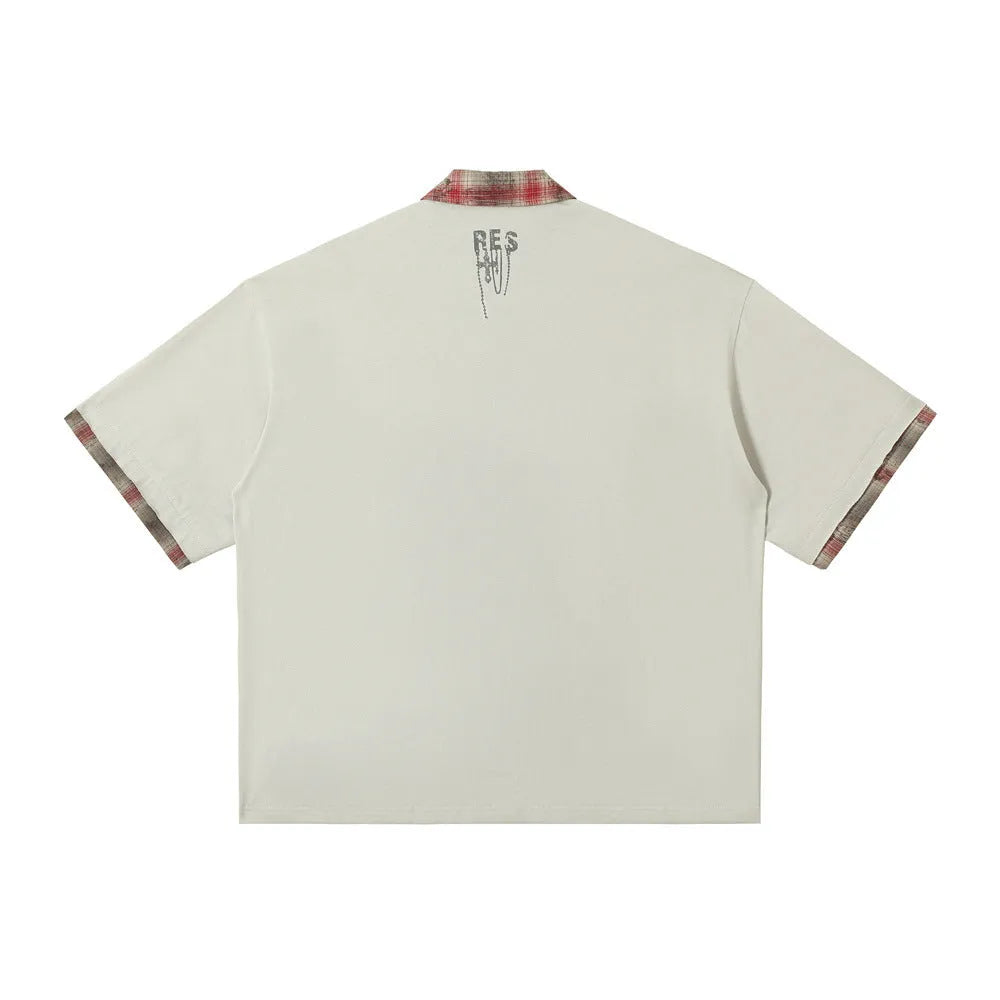 Men's loose blue cotton top with graffiti print on lapel and asymmetrical streetwear design.