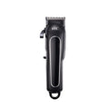 Black professional digital hair clipper and trimmer kit with charger, 4 comb guides, oil, and cleaning brush on a white background.
