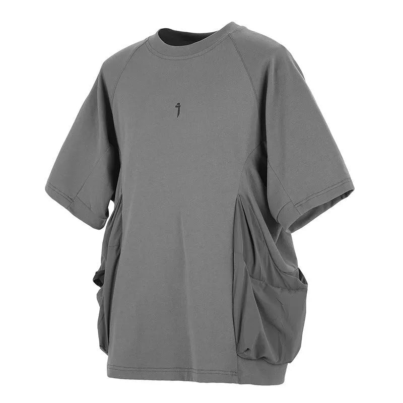 Men's loose black cotton t-shirt with two large pockets and round neck