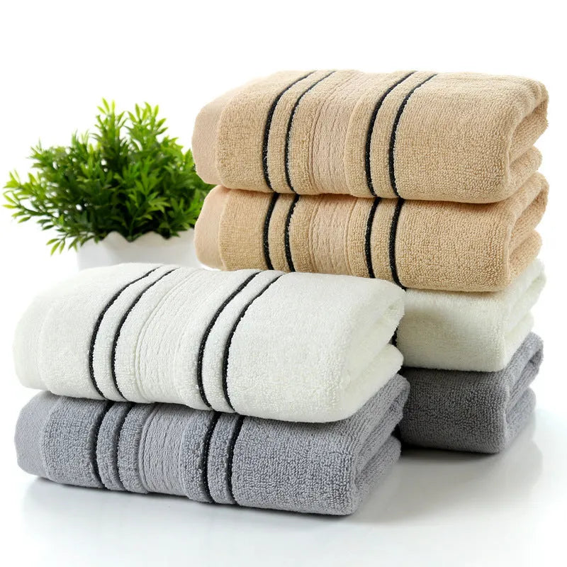 White 100% cotton jacquard towel set with 70x140cm bath towel and two 34x74cm hand towels