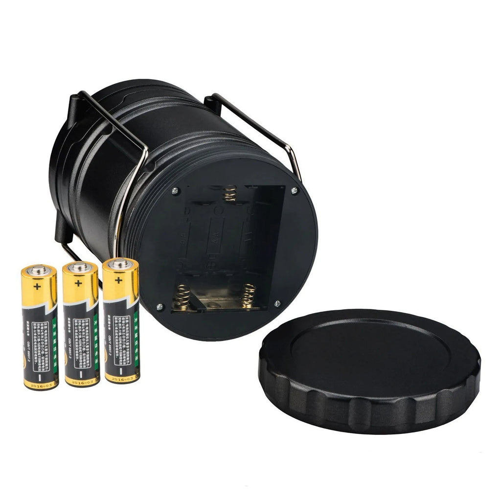Gold multifunctional COB camping lantern with solar panel, telescopic design, and hook on a wooden table