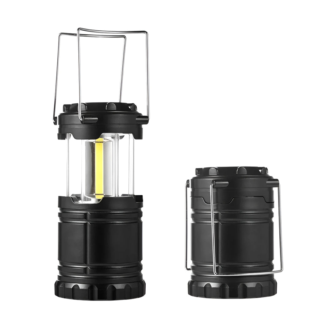 Gold multifunctional COB camping lantern with solar panel, telescopic design, and hook on a wooden table