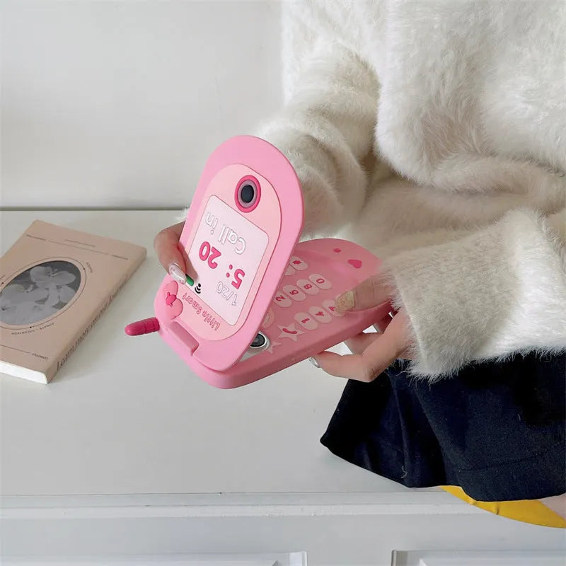 Light pink silicone flip phone shape mirror case for iPhone with cute cartoon design