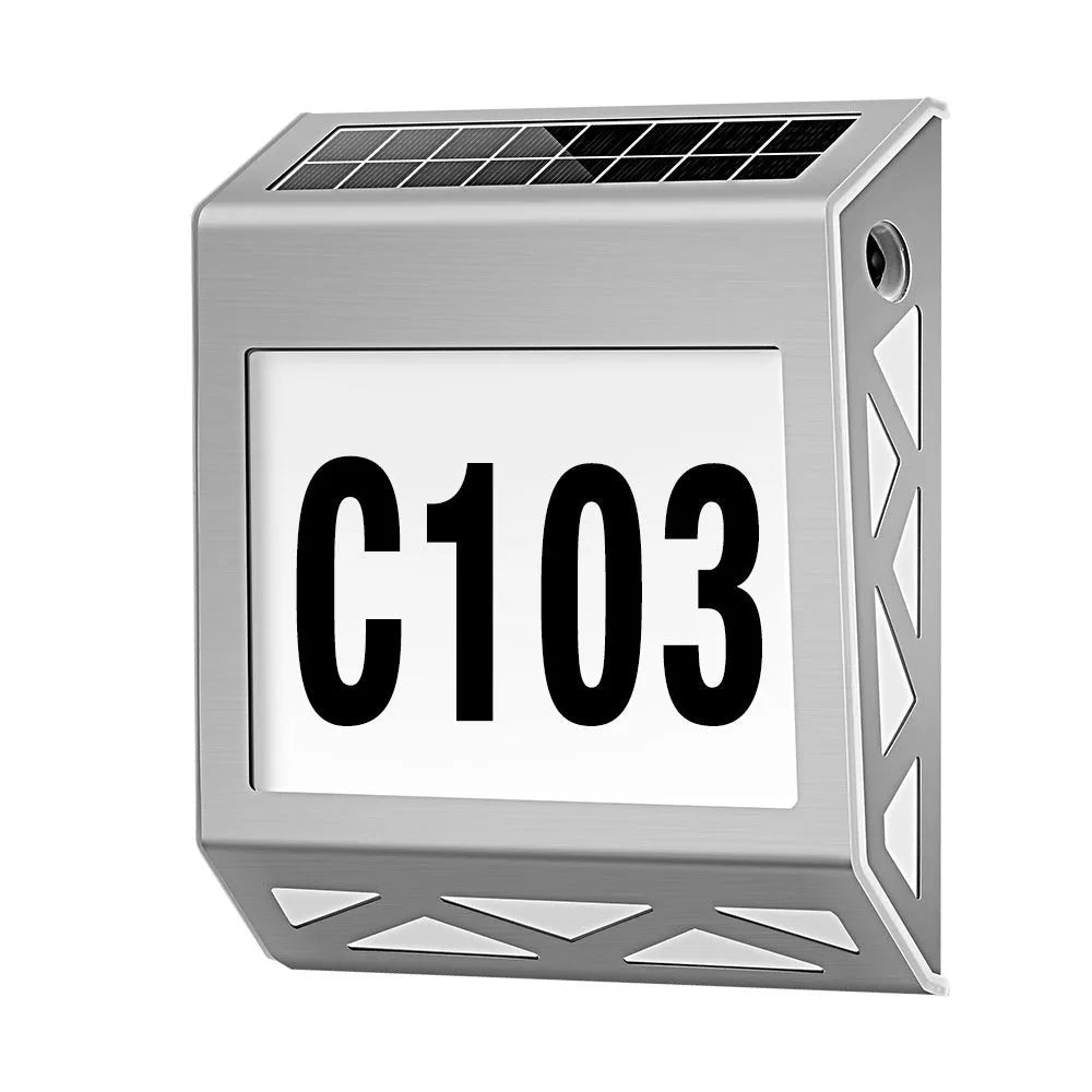 Black solar-powered doorplate light with LED digital numbers for outdoor house address illumination