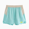Man's loose grey workout shorts with elastic waist and lace-up fly, side view.