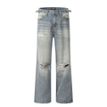 Blue men's straight-leg jeans with ripped details and a zipper fly, showing retro style.