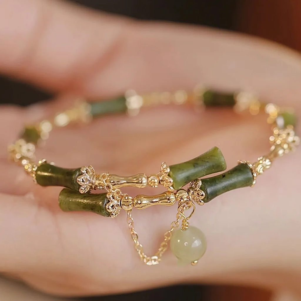 Women's handmade bamboo bracelet with plum wine colour and baking varnish finish
