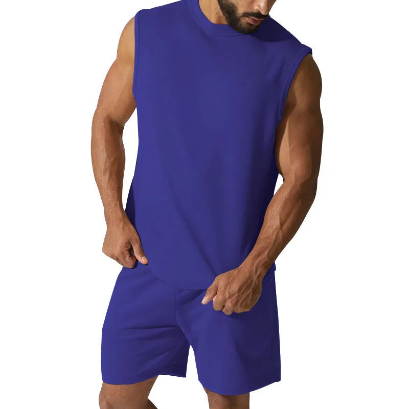 Men's sleeveless cotton blend sports suit with matching shorts in a solid colour.