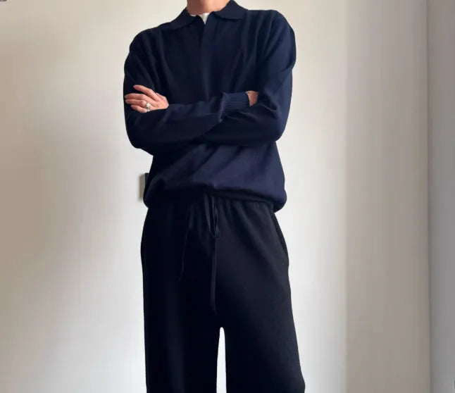 Men's pure wool polo sweater with lapel collar in milky white colour showing loose fit and long sleeves