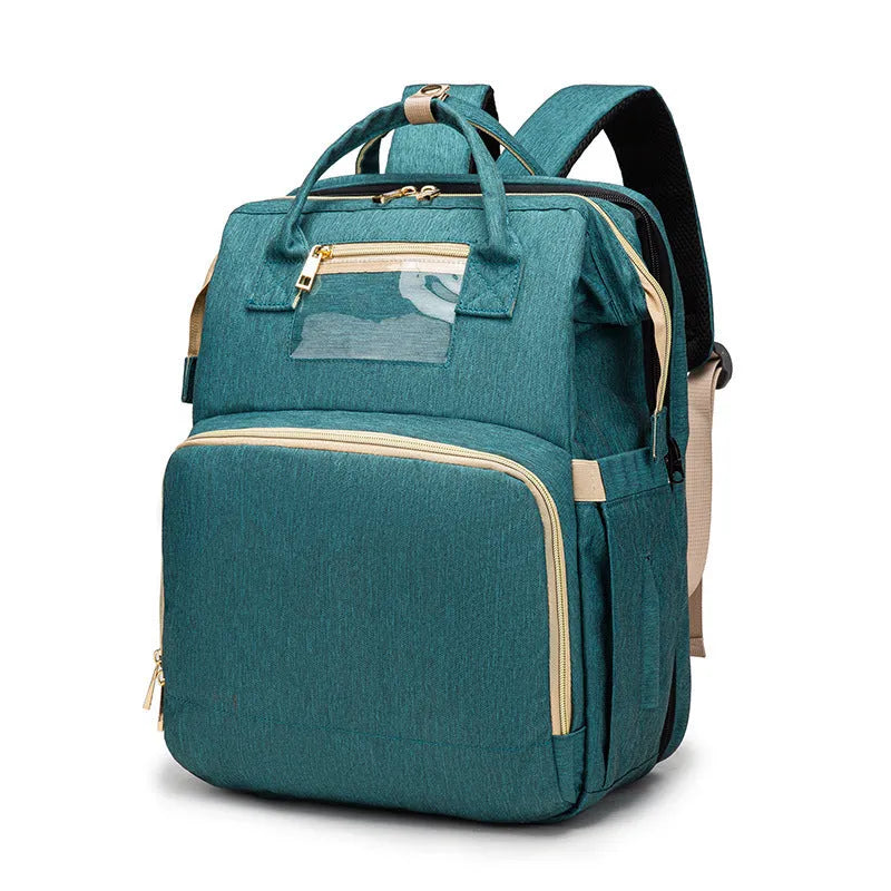 Folding baby bag bed backpack with portable mattress, USB charging option, front pocket, and multiple colour choices