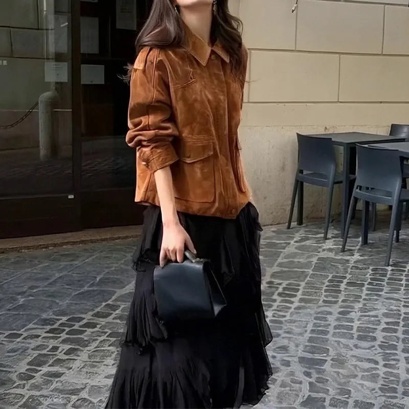 Women's bright brown suede-style street chic coat with regular sleeves on a hanger