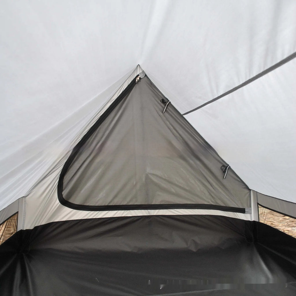 Brown A-line pole-free cabin tent set up with hiking poles showing spacious interior for 2-3 campers