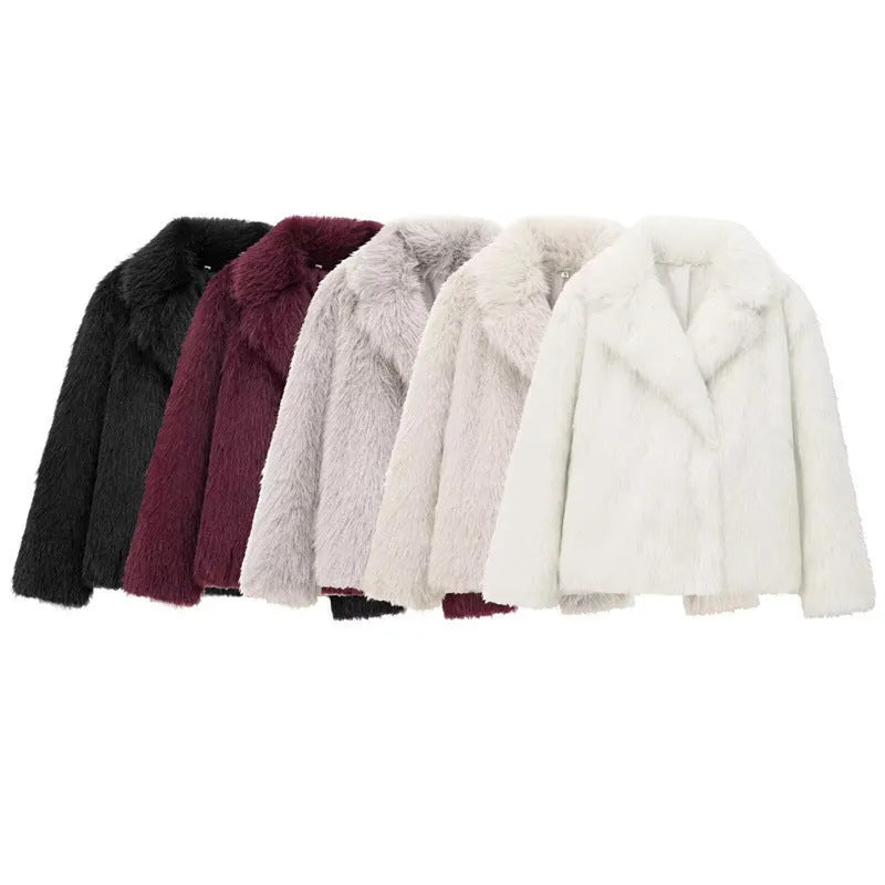 Women's white faux fur jacket with lapel collar and long sleeves shown on mannequin