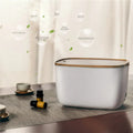 GX-22K white household aroma diffuser and humidifier with night light on a wooden table.