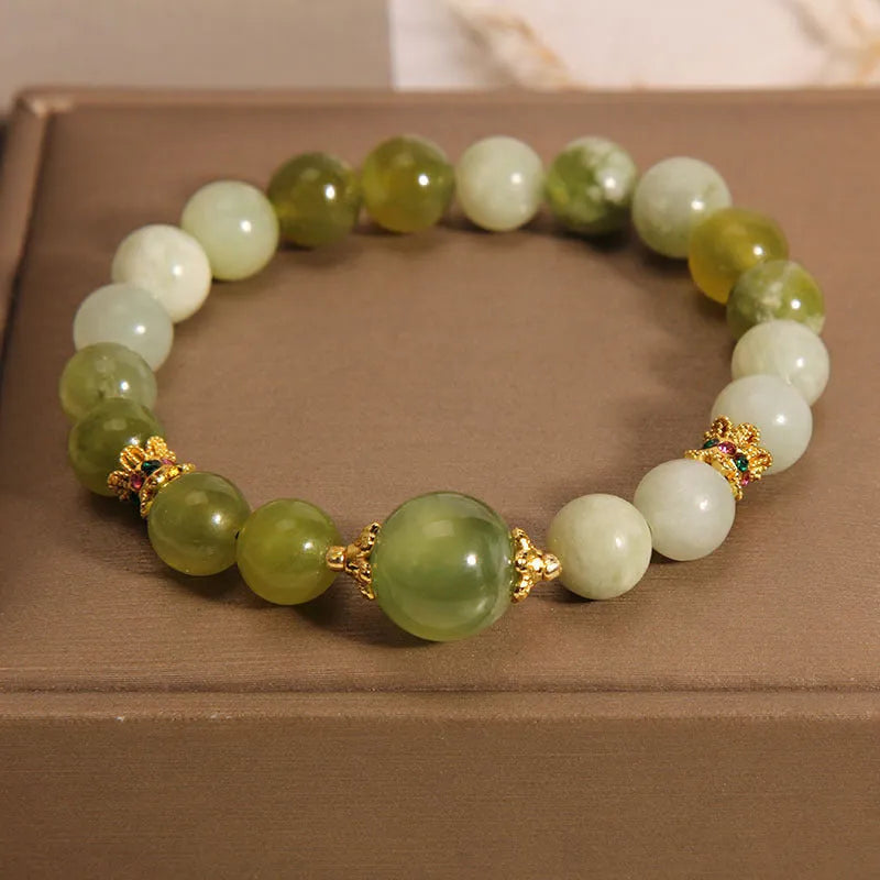 Women's jade bracelet in Xiuyan jade green colour with original design