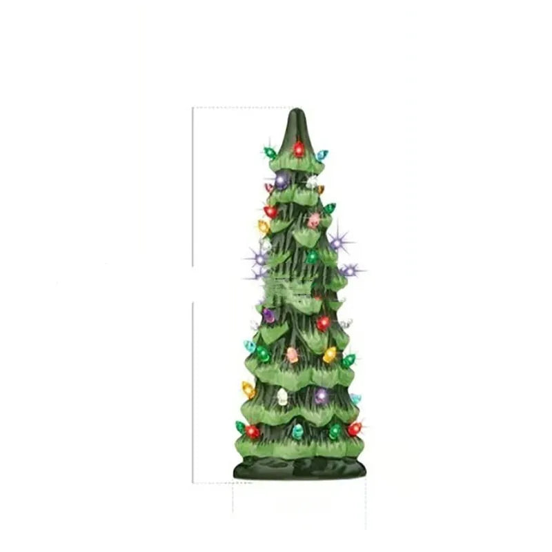A resin Christmas tree-shaped lamp ornament with LED lights, shown in different sizes on a table.