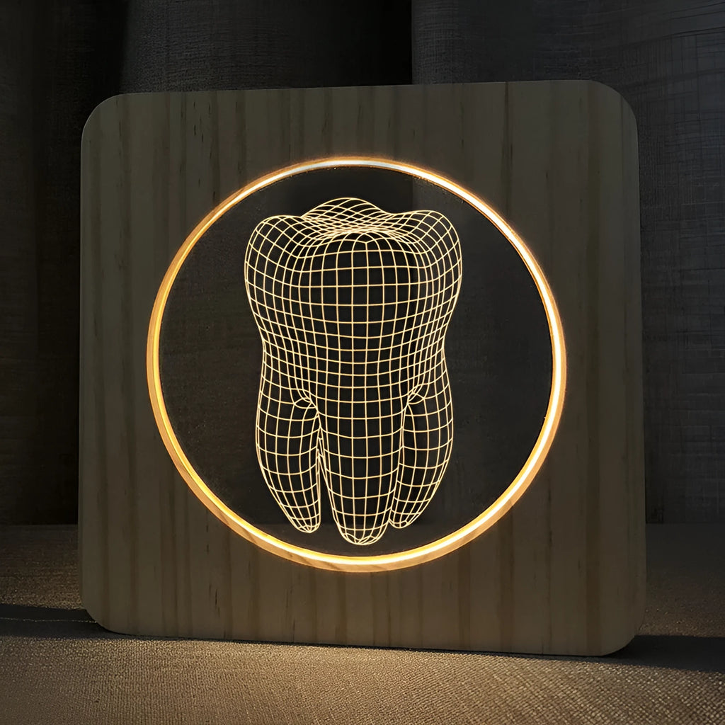 Wood-coloured acrylic night lamp in shape of a tooth, with USB cable.