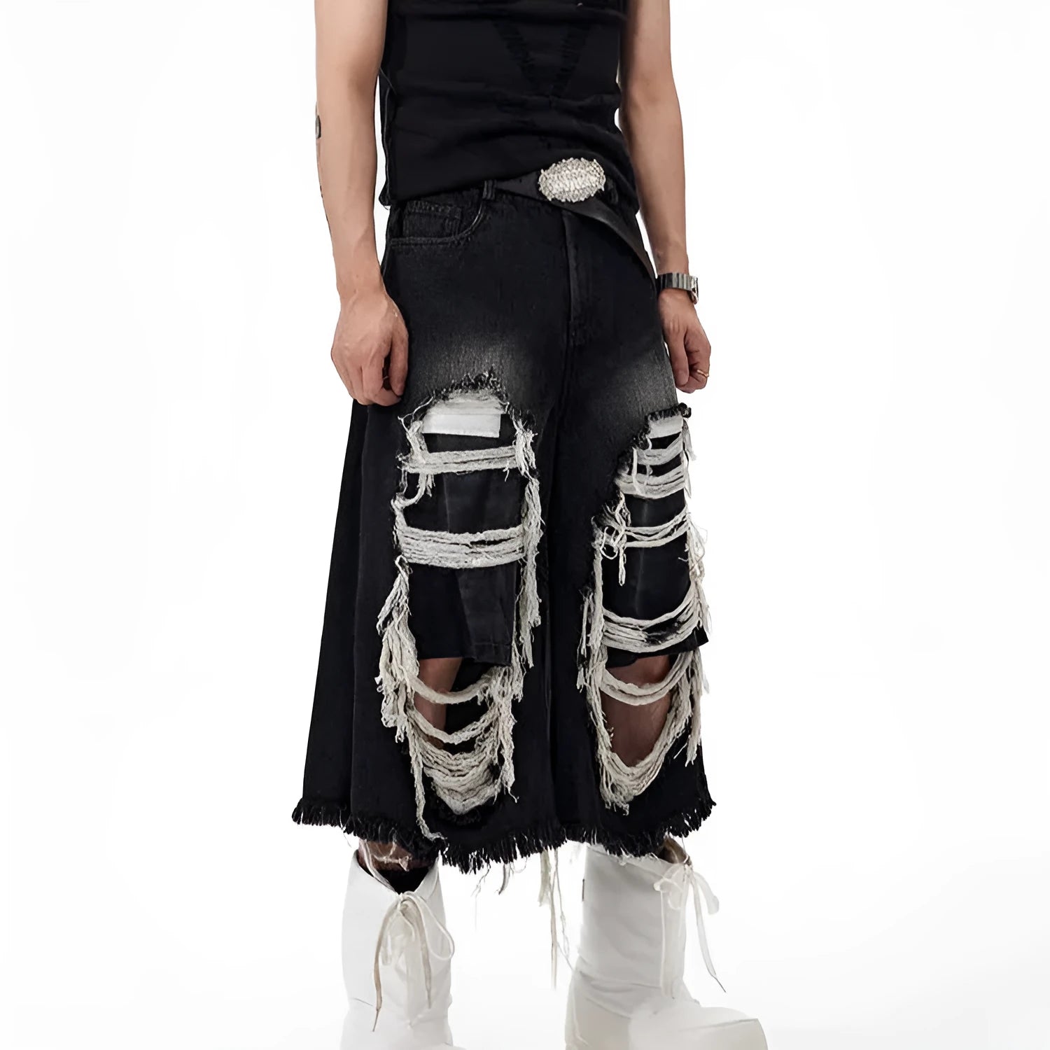 Black women's cropped wide-leg jeans with a ripped patch detail on the leg.