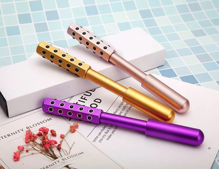 Germanium particle roller facial massage instrument in purple colour with 193mm handle