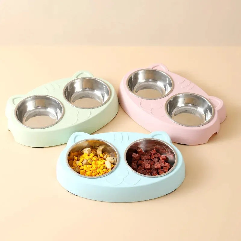 Blue macaron-shaped plastic pet feeder tray with two bowls for food and water