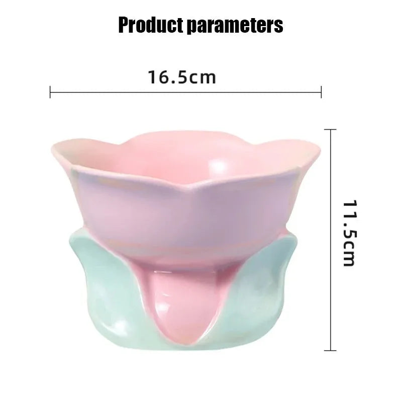 Blue ceramic raised pet bowl with floral pattern and non-slip base for cats or small dogs
