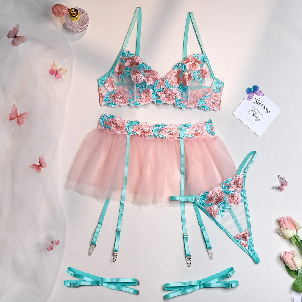 Women wearing pink embroidered mesh pettiskirt suit with matching top and skirt