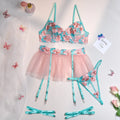 Women wearing pink embroidered mesh pettiskirt suit with matching top and skirt