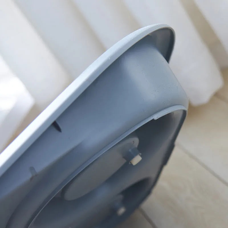 Double plastic pet bowl in grey, blue, green, or pink, measuring 45x35x8cm with anti-skid base.